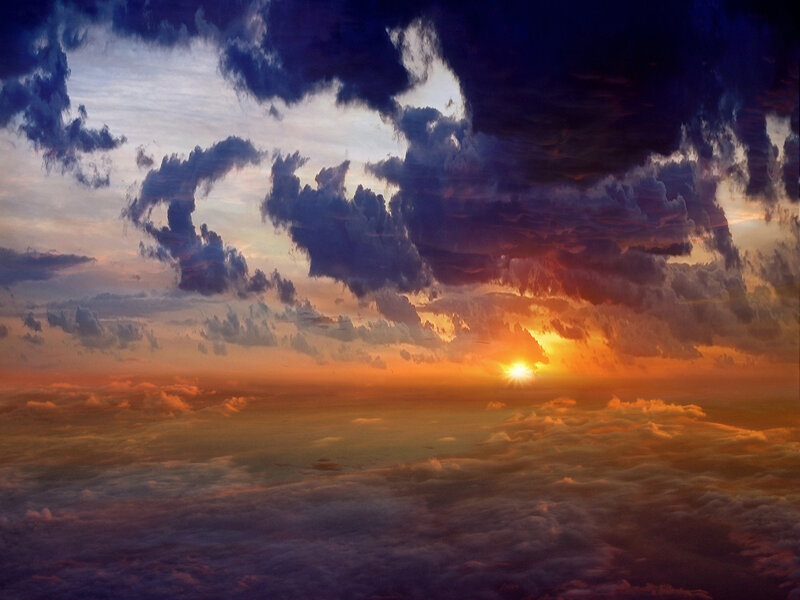 Sunset over the clouds