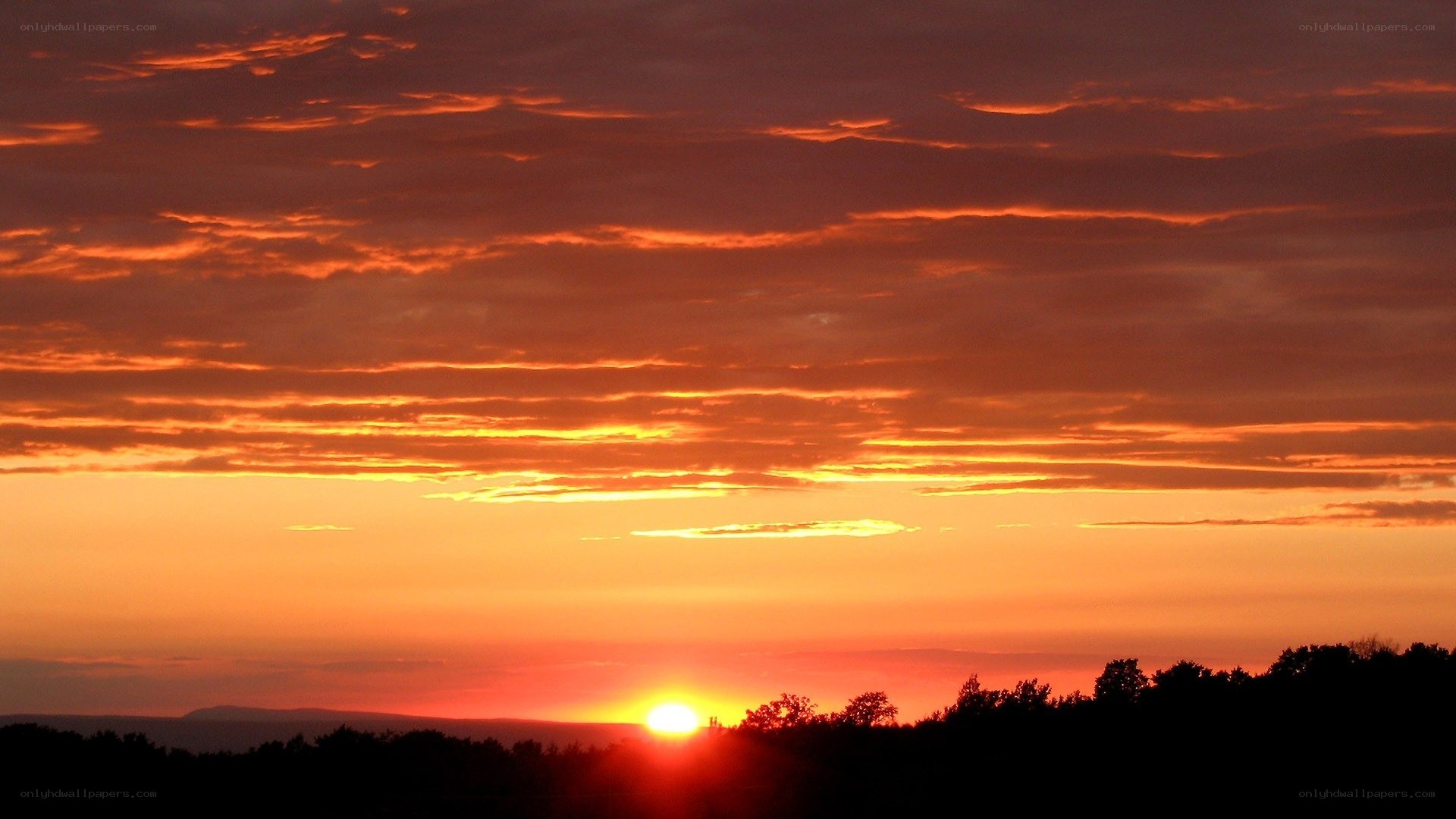 sunset over the hills