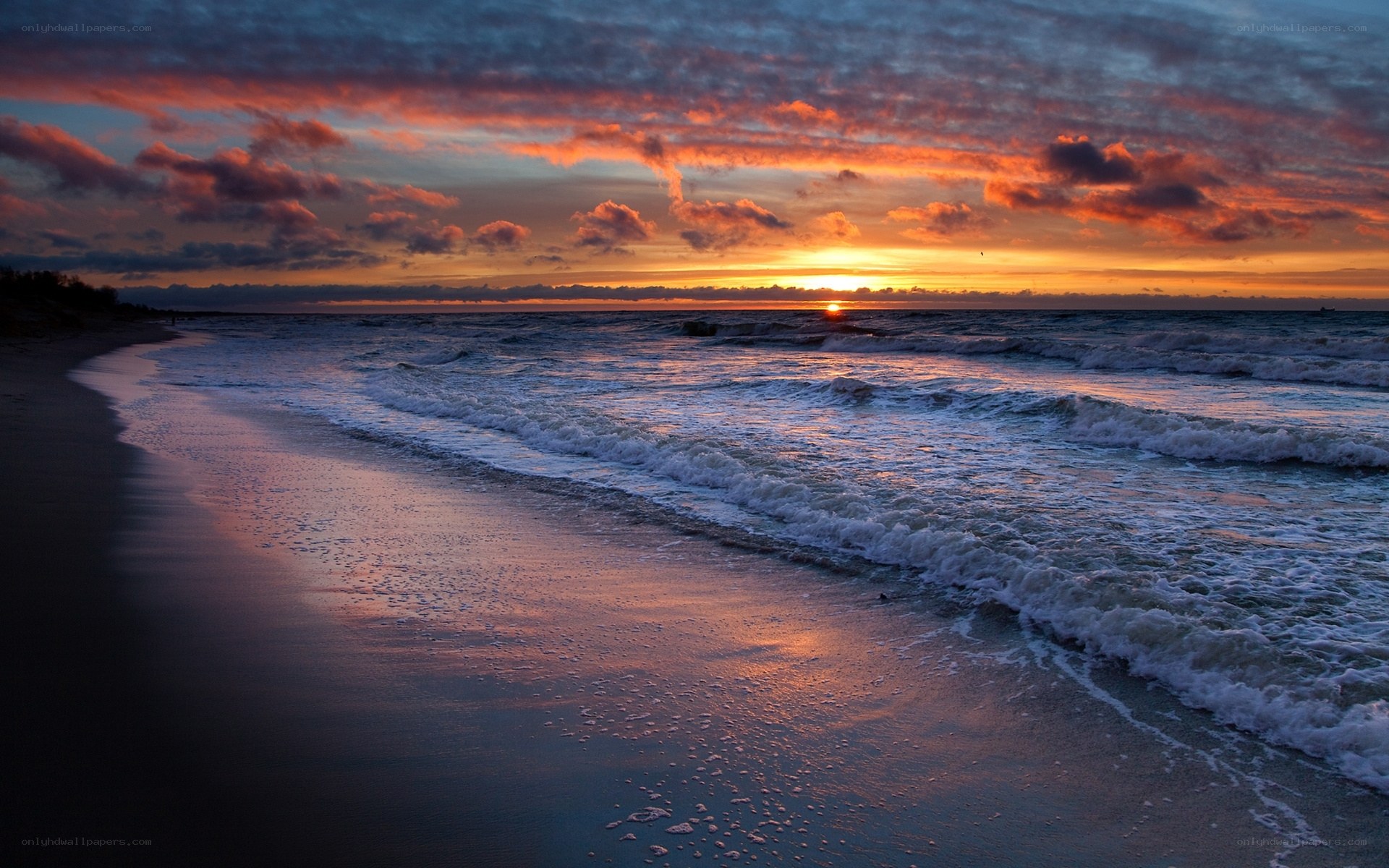 Sunset over the ocean beach