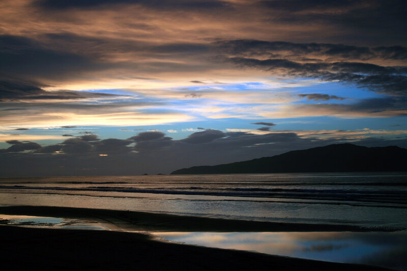 Sunset over the ocean beach
