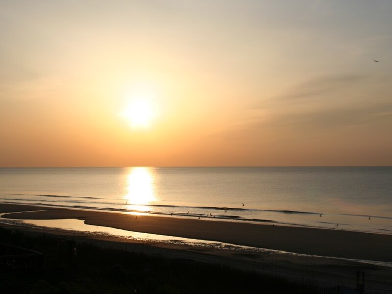 sunset over the ocean beach