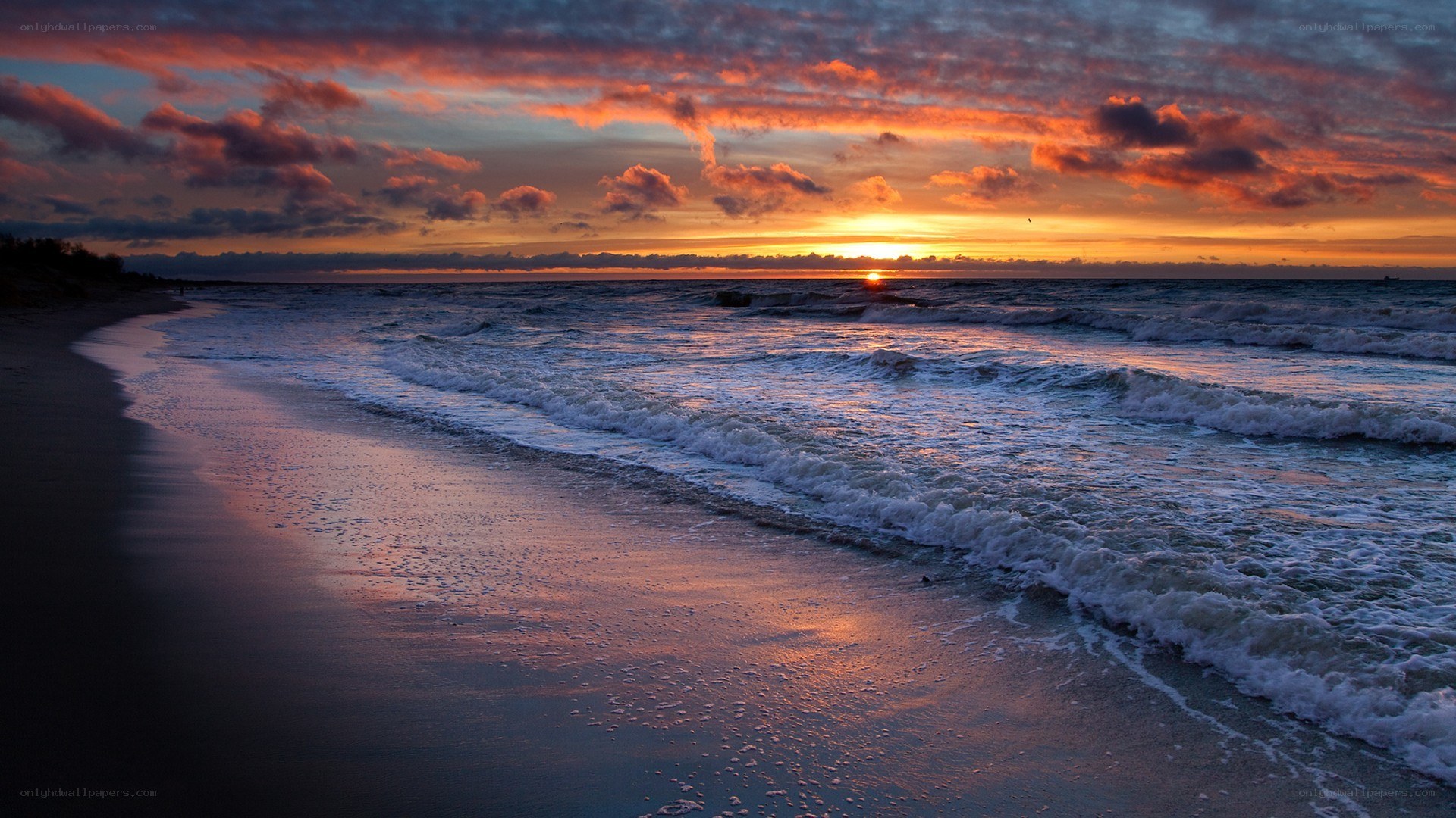 Sunset over the ocean beach