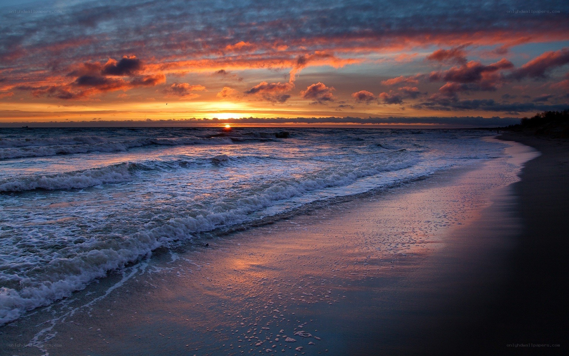 Sunset over the ocean beach