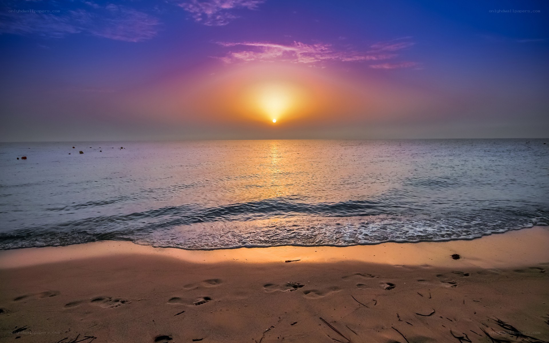 Sunset over the ocean beach