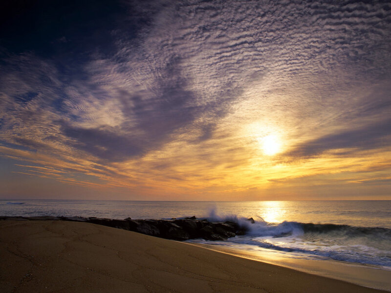 Sunset over the ocean beach