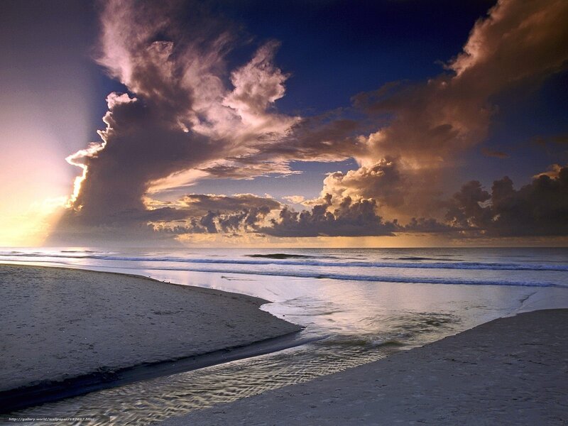 Sunset over the ocean beach