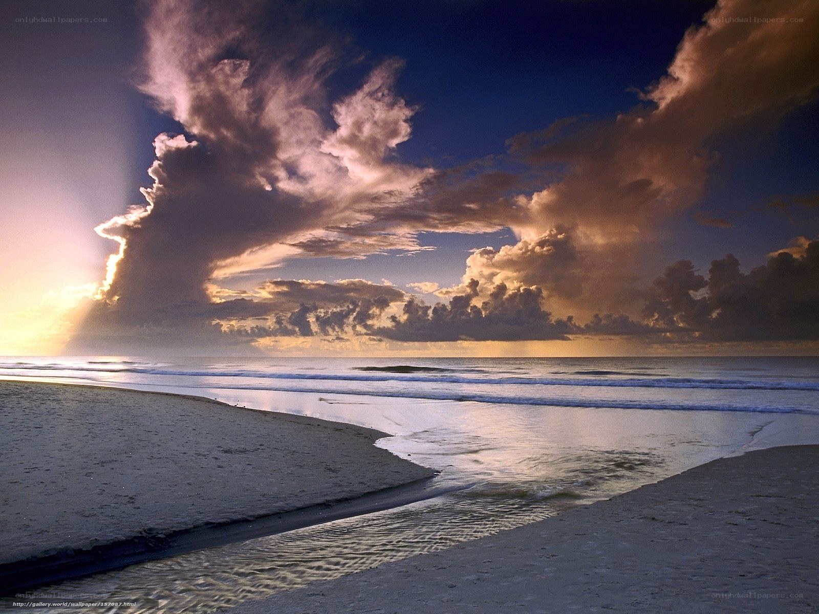 Sunset over the ocean beach