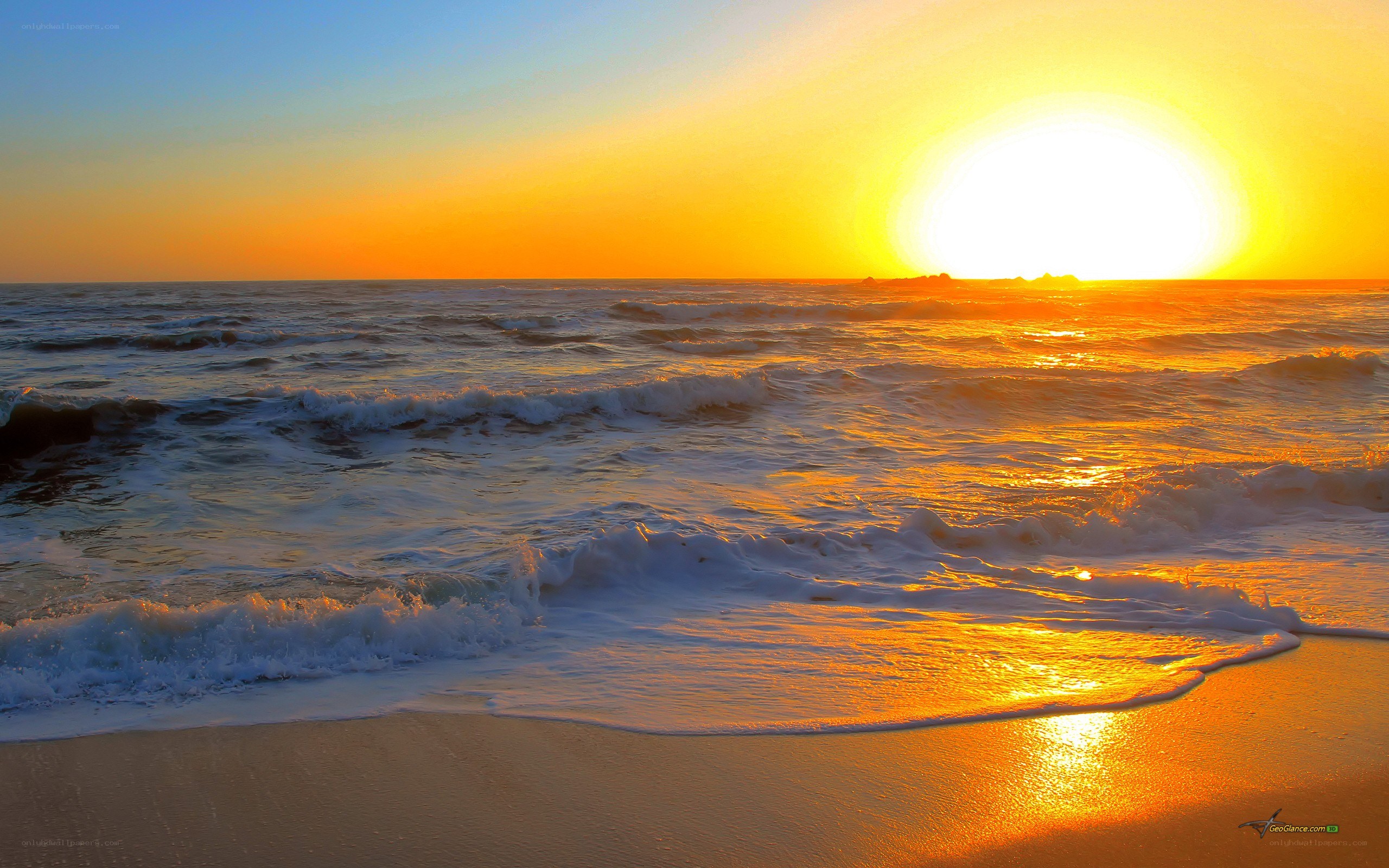 Sunset over the ocean waves