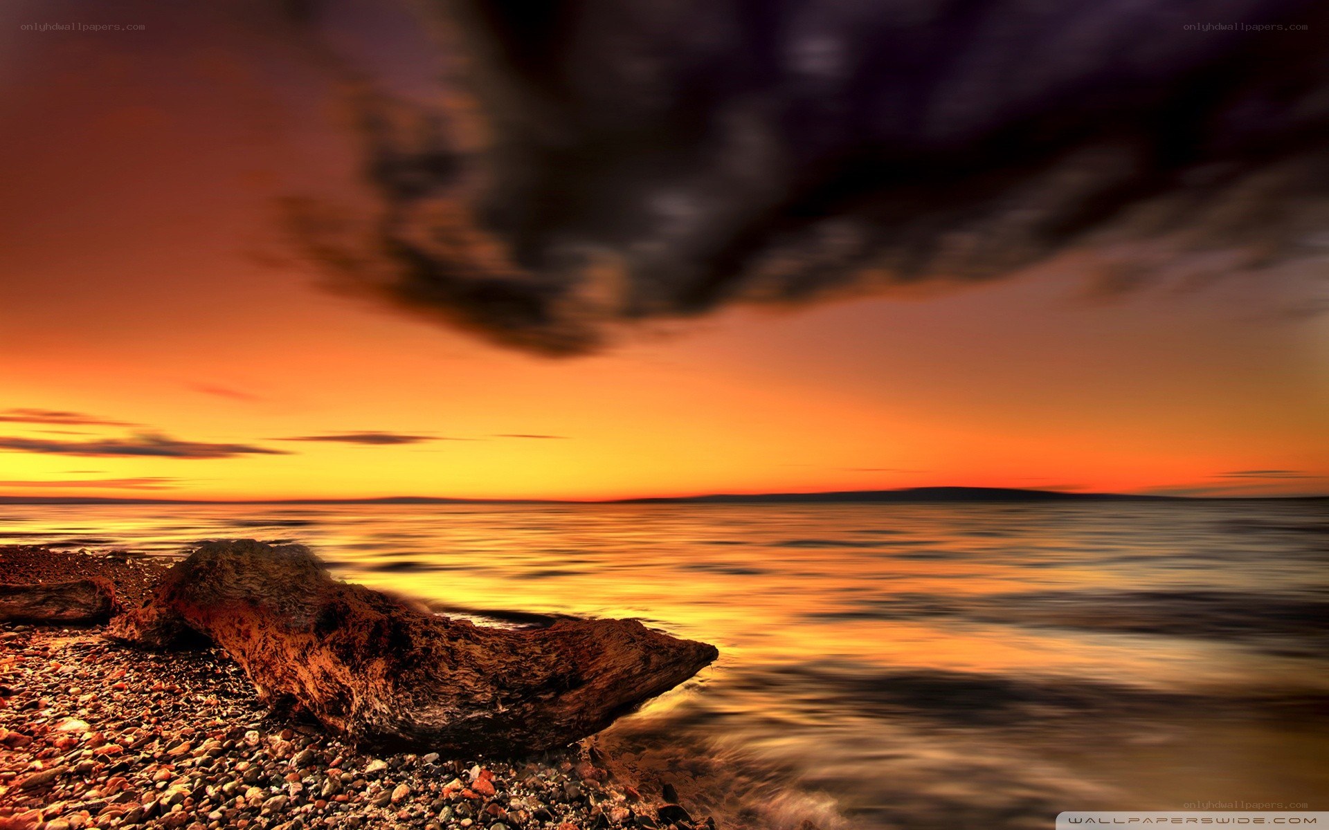 Sunset over the pebble beach