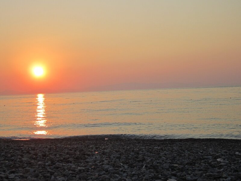 Sunset over the pebble beach