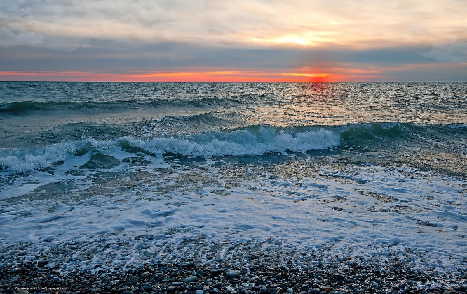 Sunset over the pebble beach