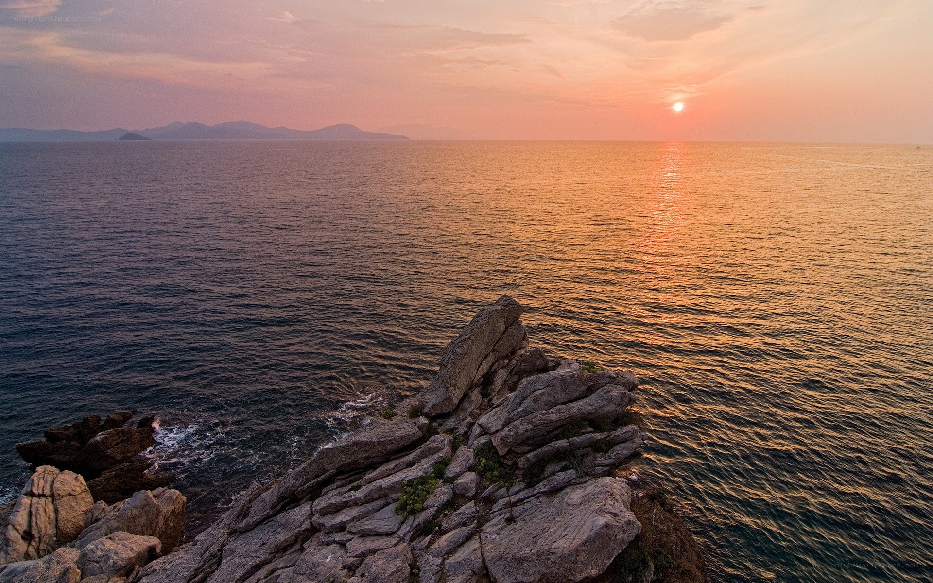 Sunset over the rocky coast