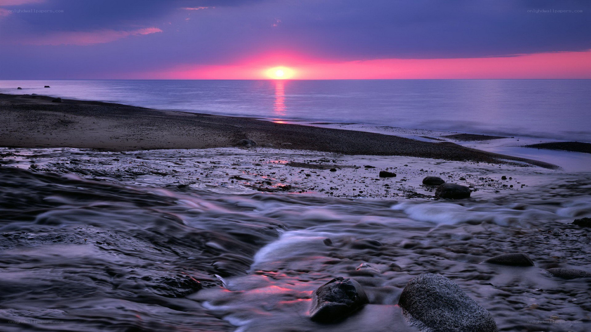Sunset over the rocky shore