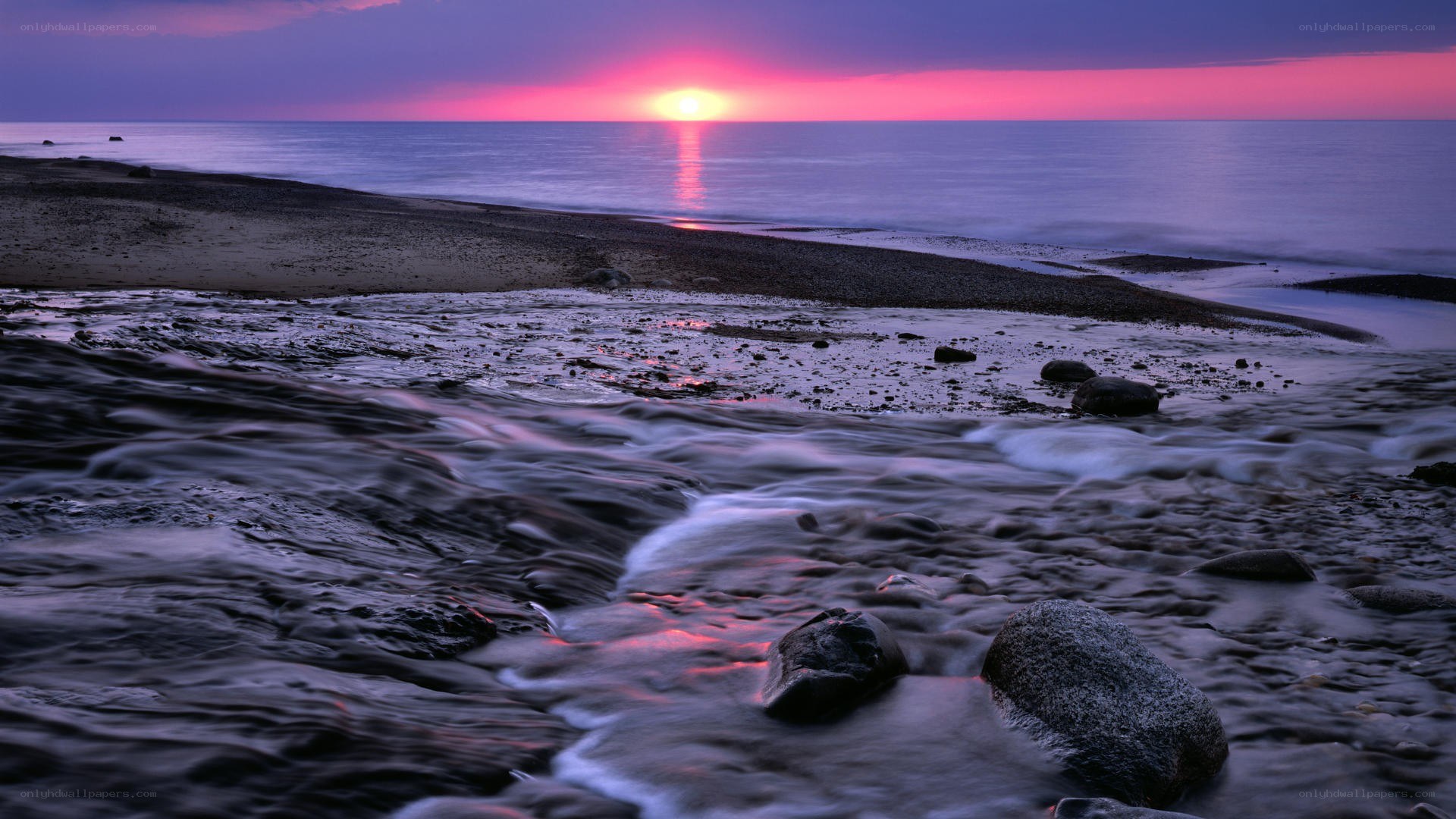 Sunset over the rocky shore