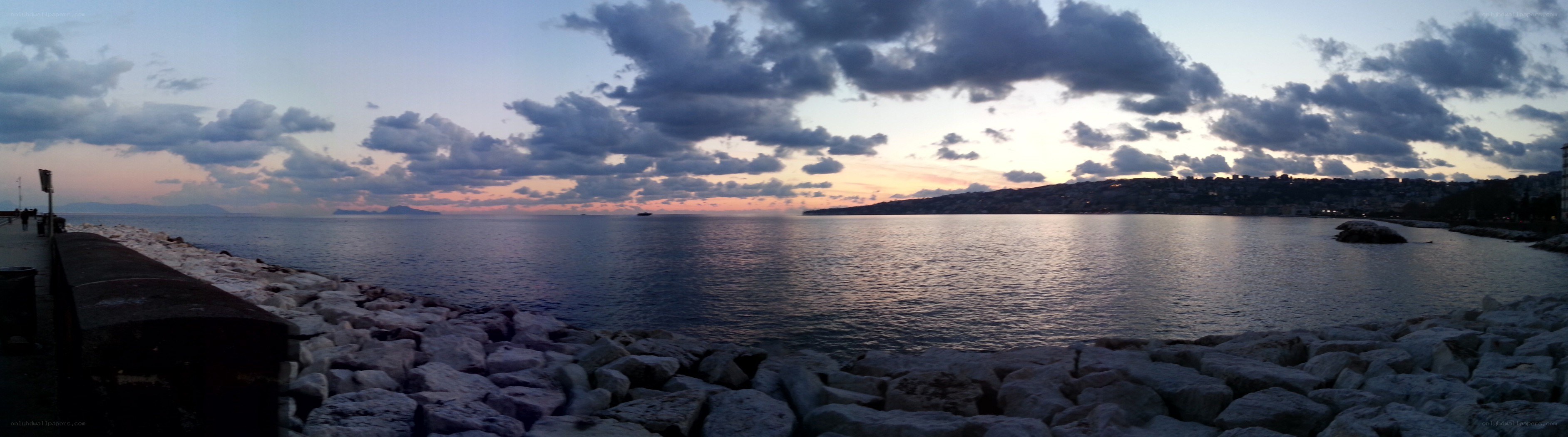 Sunset over the sea at dusk