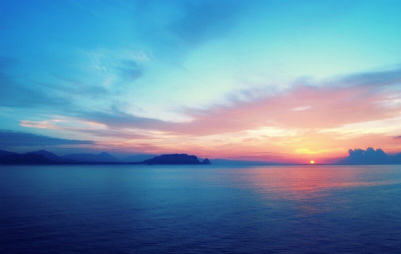Sunset over the Sea — Blue, Serene, Photograph, Mountains, Sun