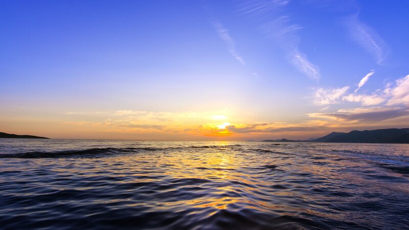 Sunset over the Sea — Blue, Serene, Photograph, Sun, Clouds