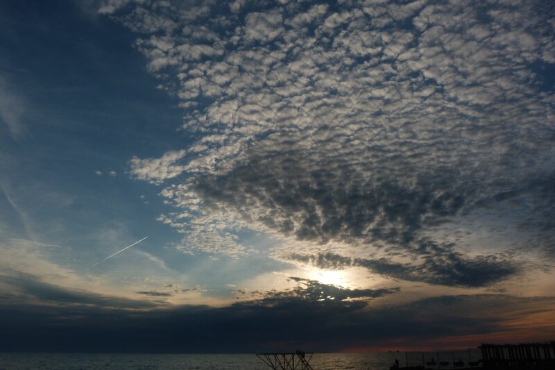 Sunset over the sea with clouds