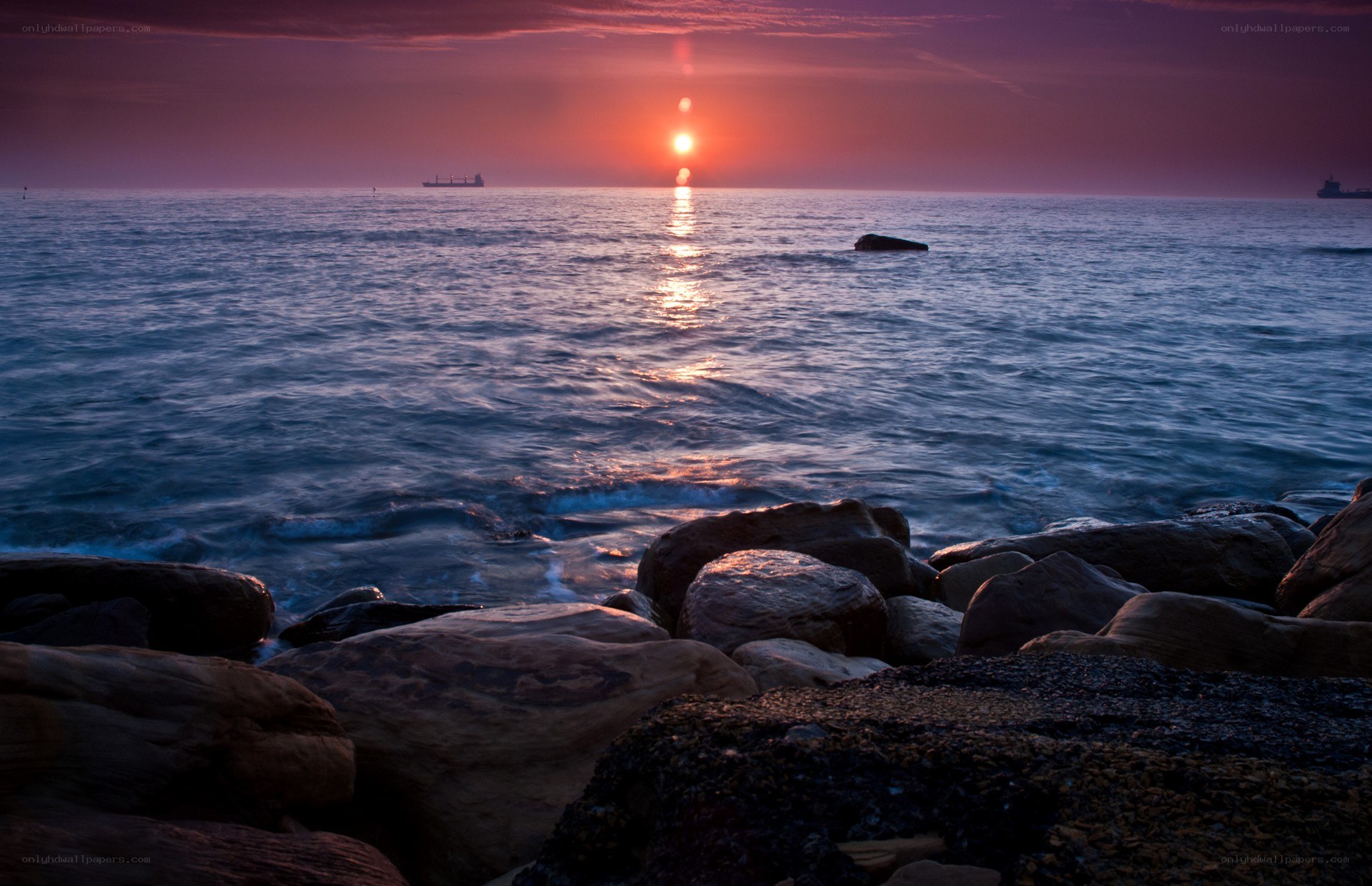 Sunset over the sea with ship