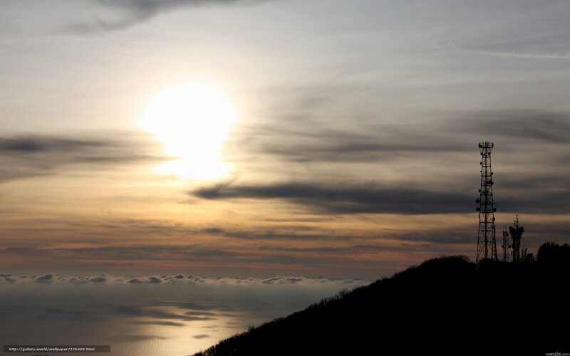 Sunset over the sea with towers