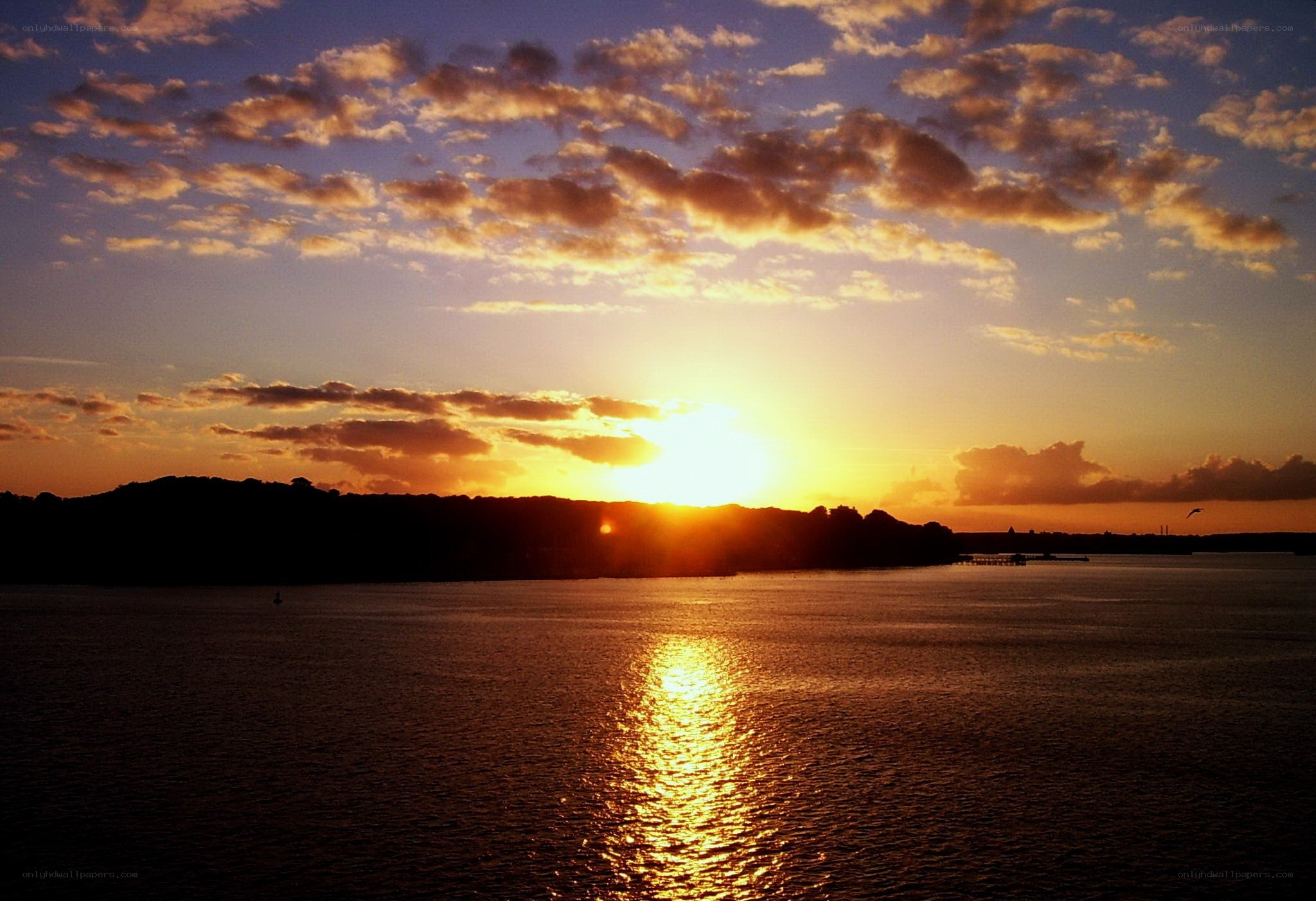 sunset over the water