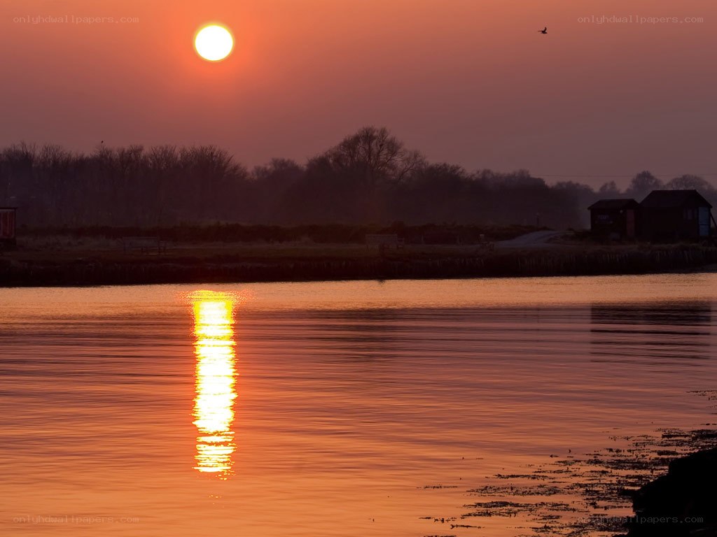 Sunset over the water
