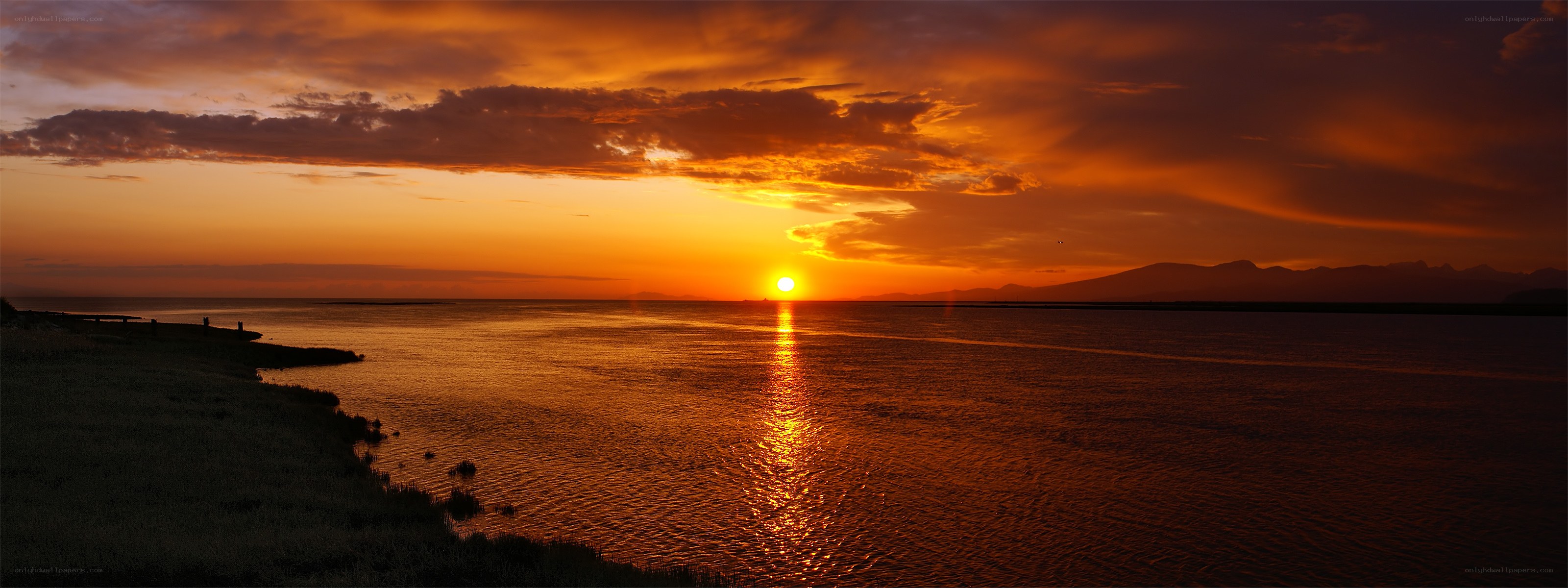 Sunset over the water
