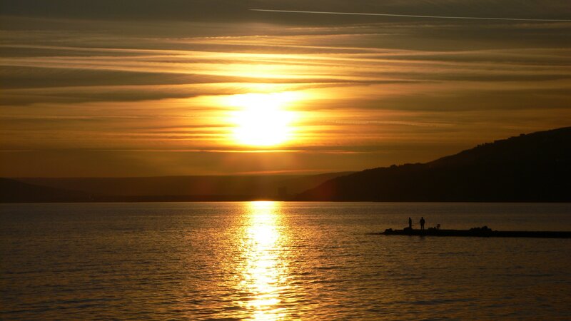 Sunset over the water