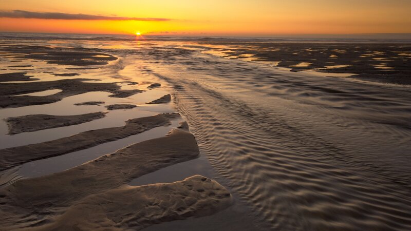 Sunset over tidal flats