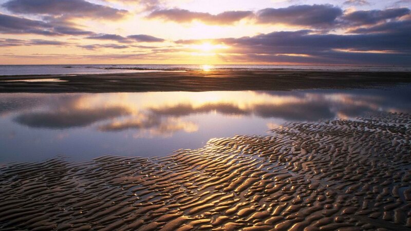 sunset over tidal flats