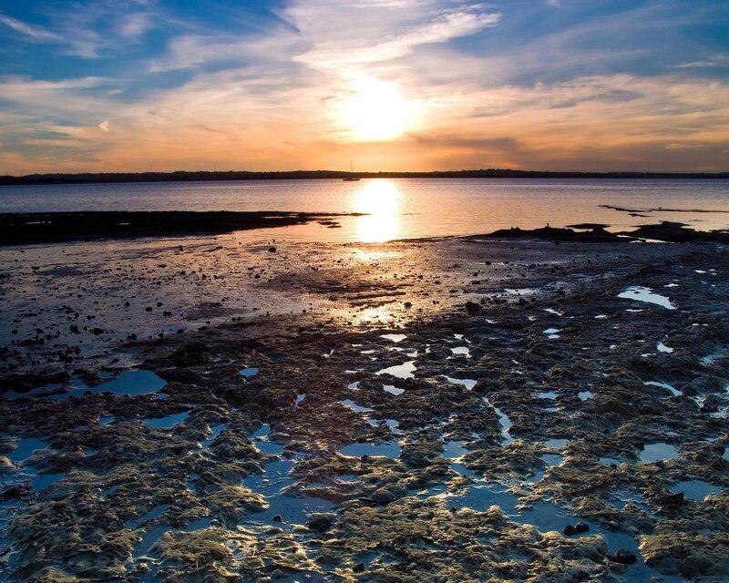 Sunset over Tidal Flats — Blue, Serene, Photograph, Sun, Water, Sky, Rocks