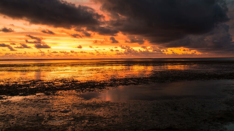 Sunset over Tidal Flats — Orange, Dramatic, Photograph, Clouds, Sky