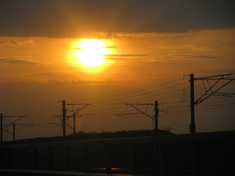 Sunset over Train Tracks — Orange