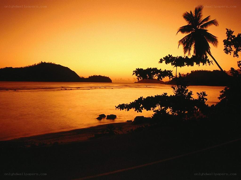 sunset over tropical bay