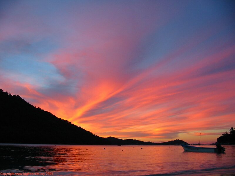 Sunset over Tropical Bay — Orange, Dramatic, Photograph