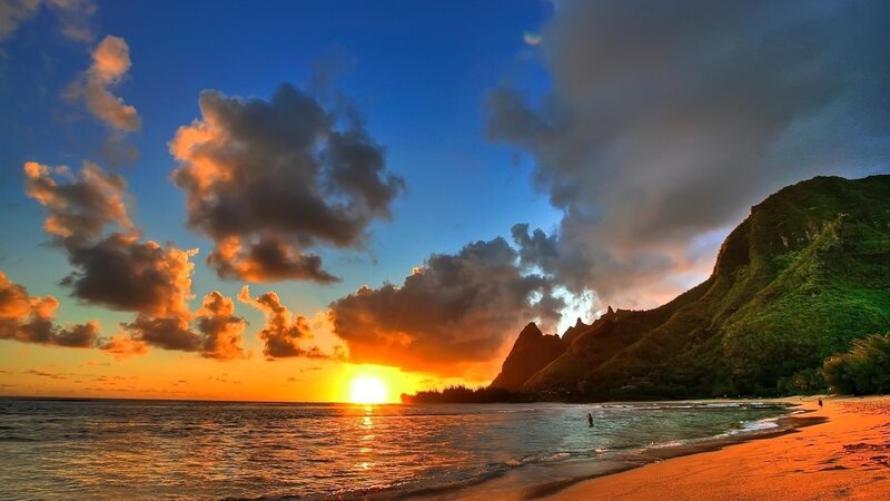 Sunset over Tropical Beach — Blue, Dramatic, Photograph, Mountain, Ocean, Clouds, Person