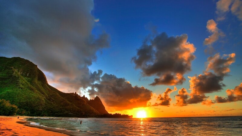 Sunset over Tropical Beach — Blue, Dramatic, Photograph, Mountain, Ocean, People