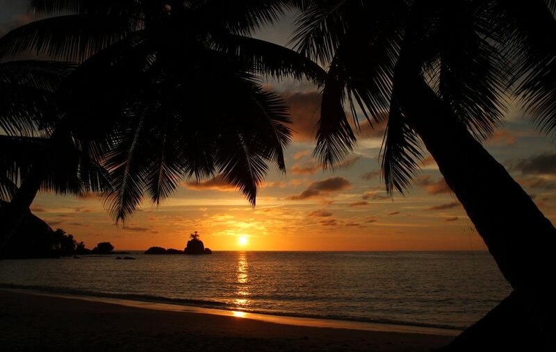 Sunset over Tropical Beach — Orange, Serene, Photograph, Palm Trees