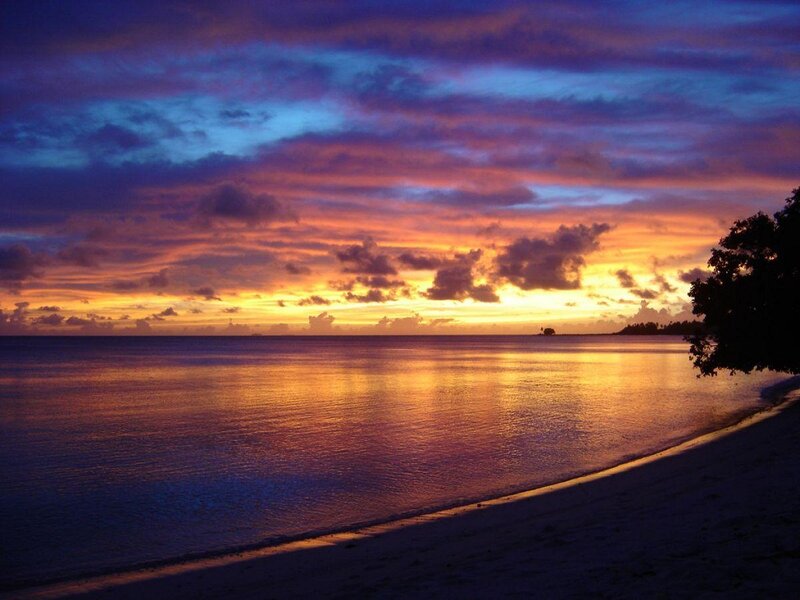 Sunset over Tropical Beach — Purple, Serene, Photograph