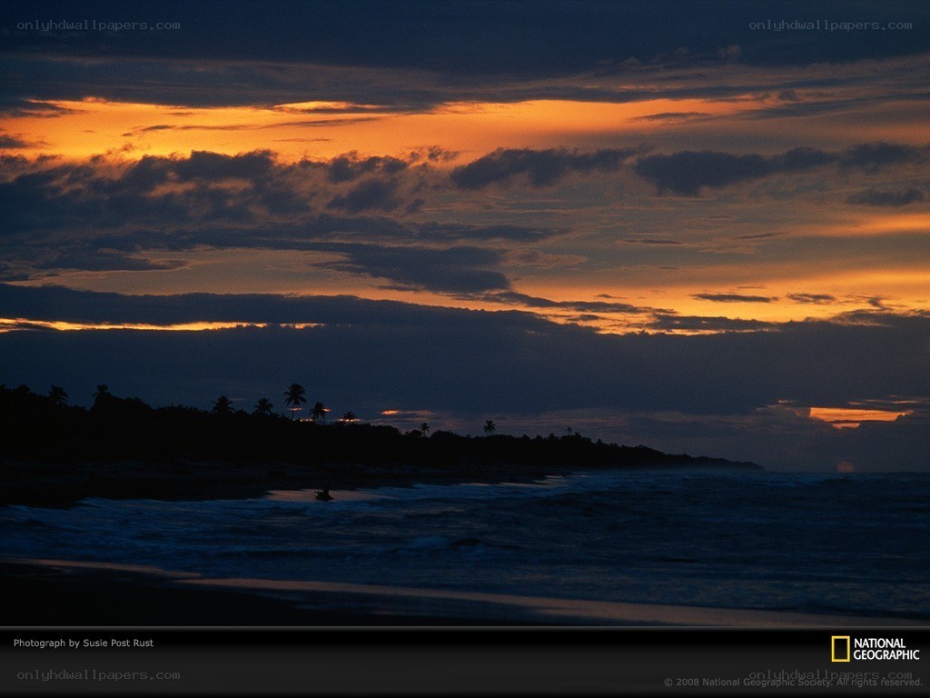 sunset over tropical coast