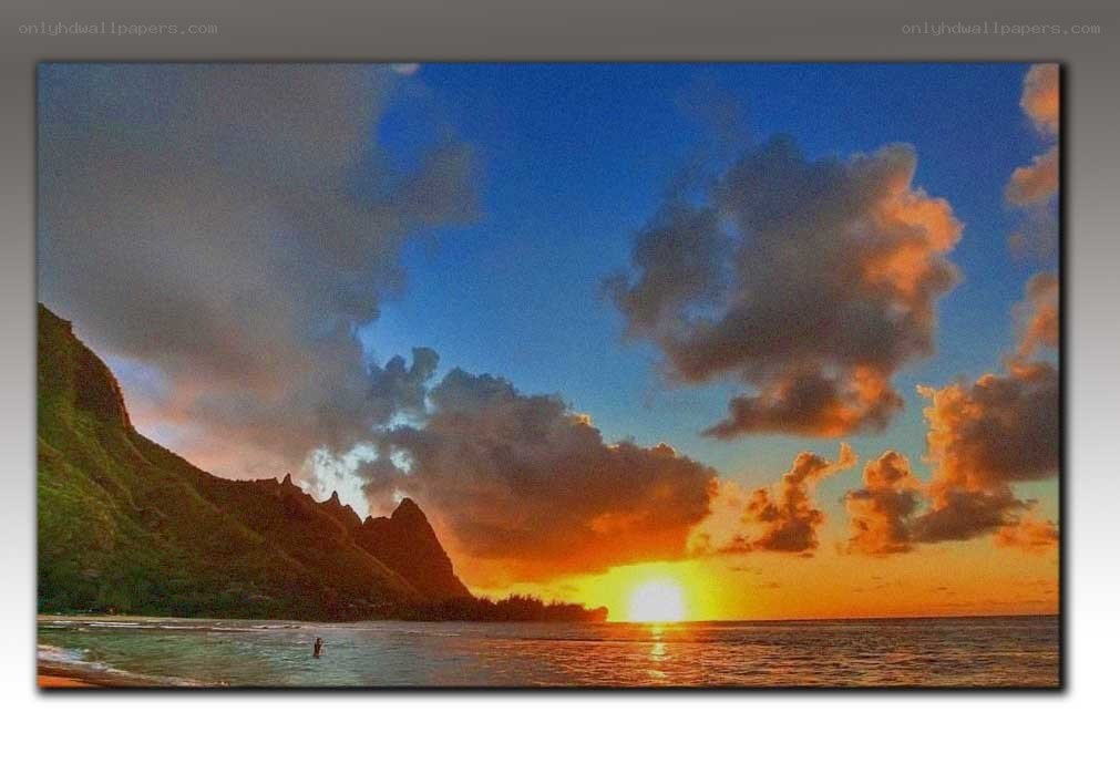 Sunset over tropical coastline