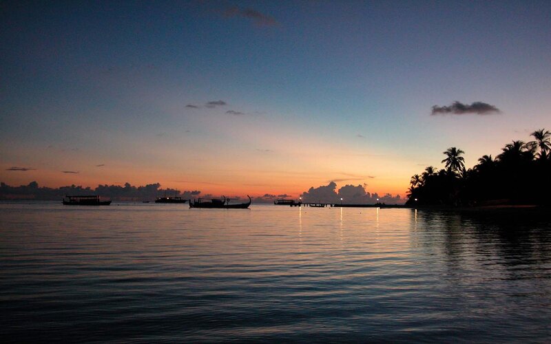 sunset over tropical island
