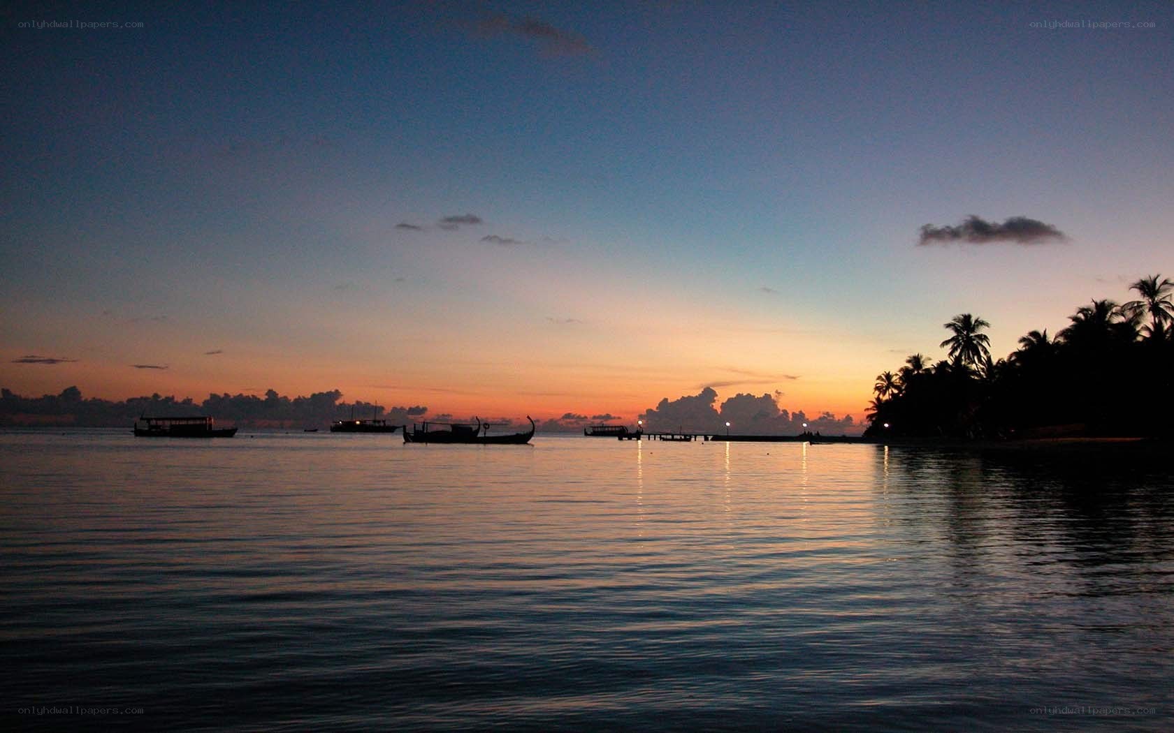 sunset over tropical island