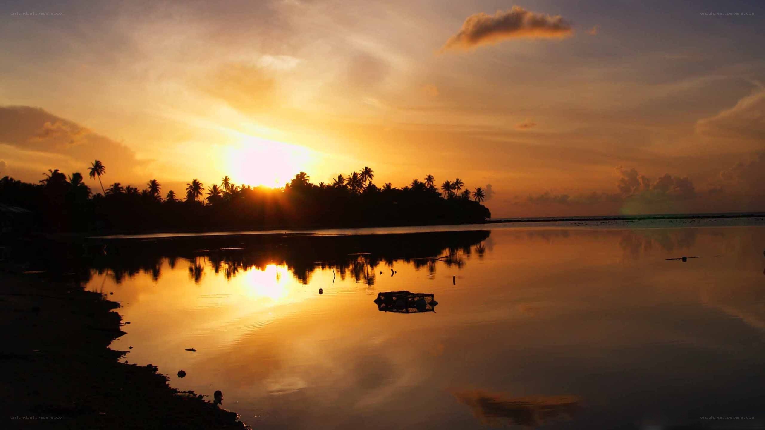 sunset over tropical island