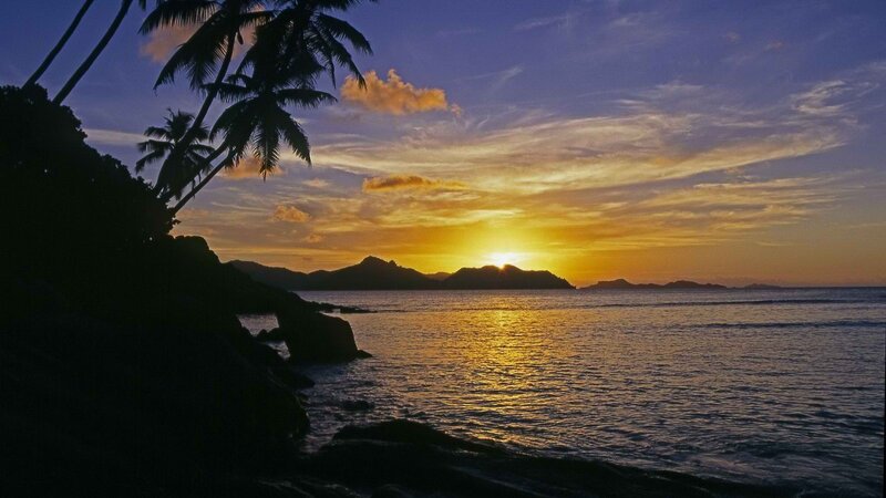 sunset over tropical island