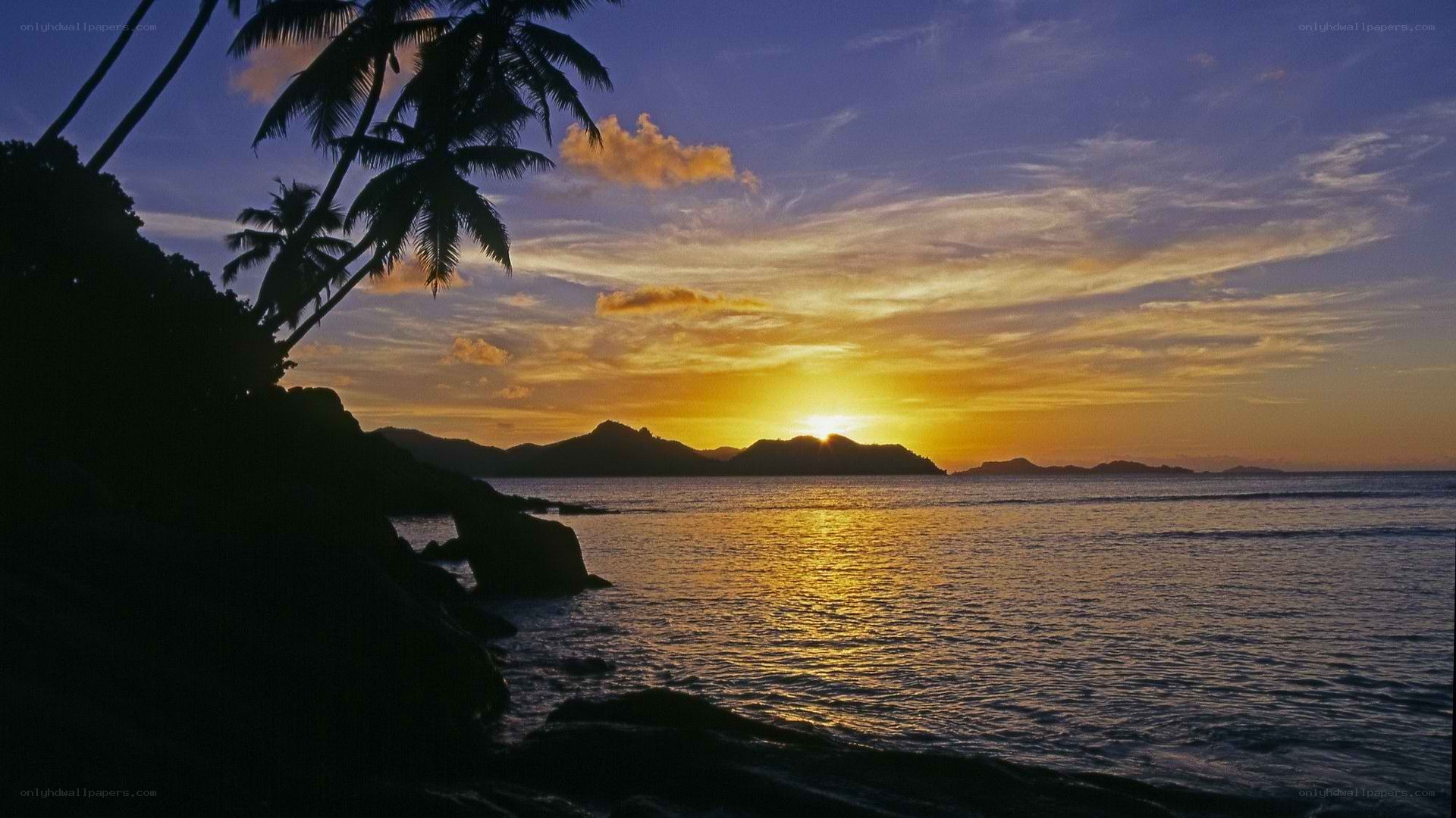 sunset over tropical island