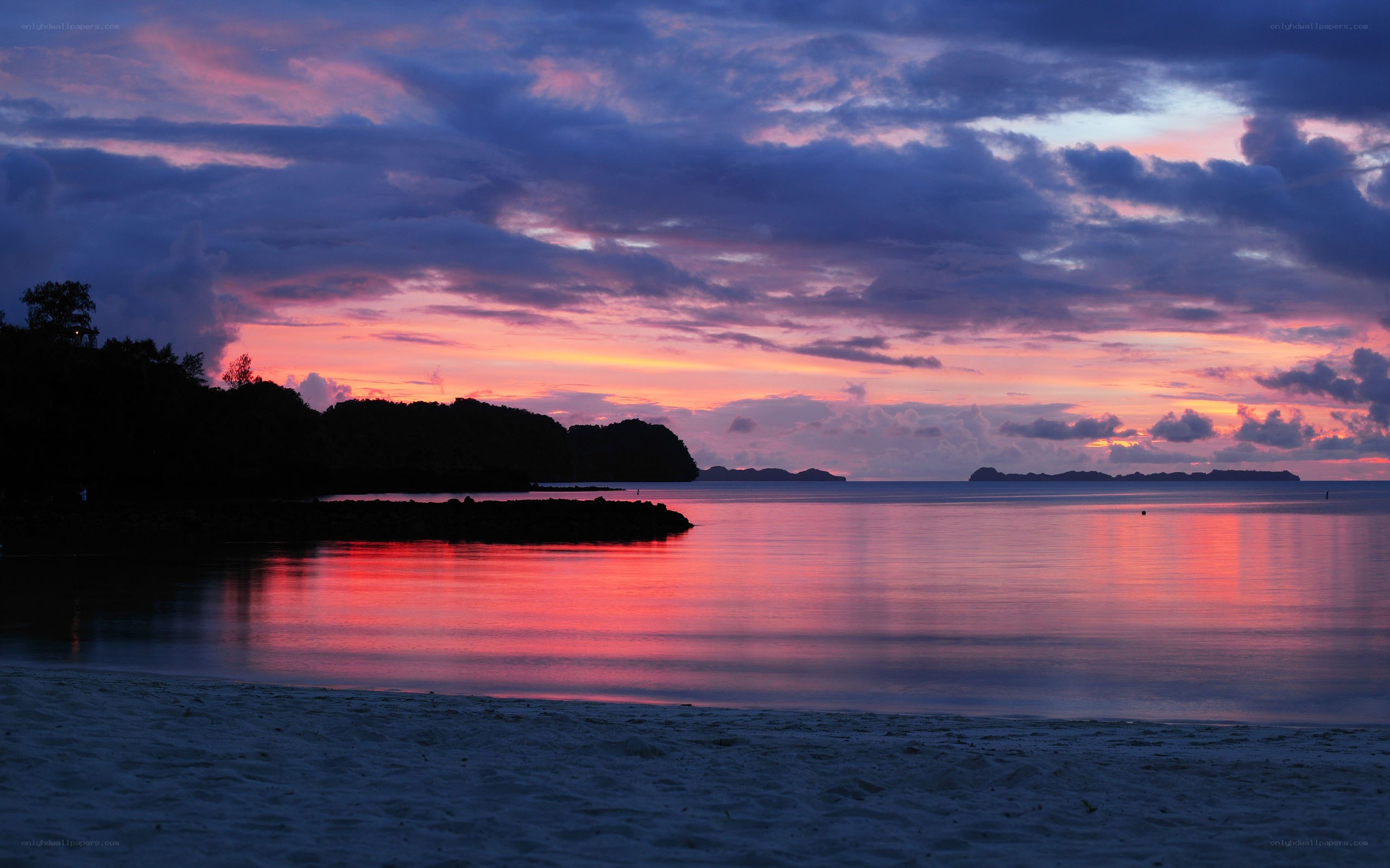 sunset over tropical island