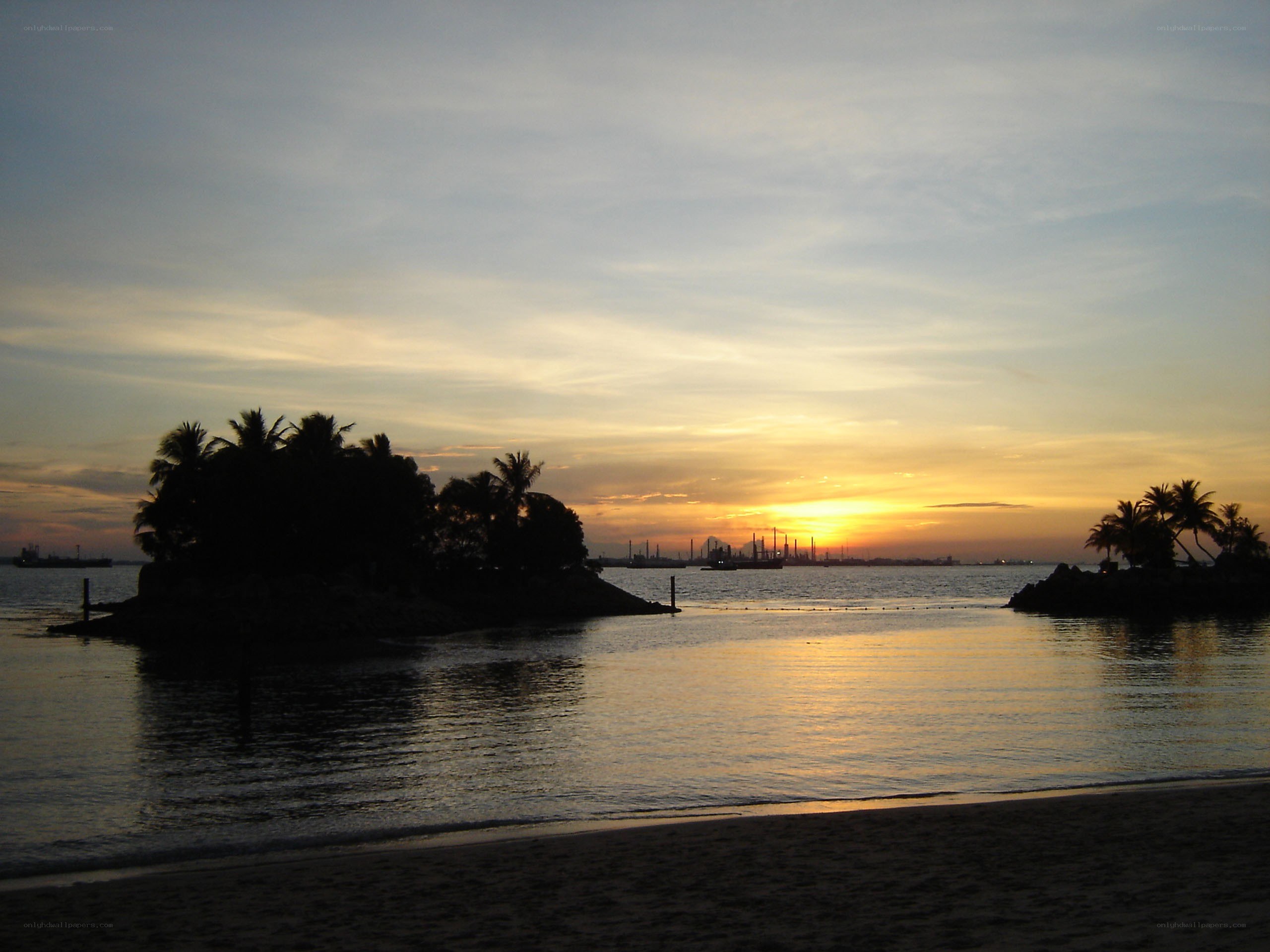sunset over tropical island