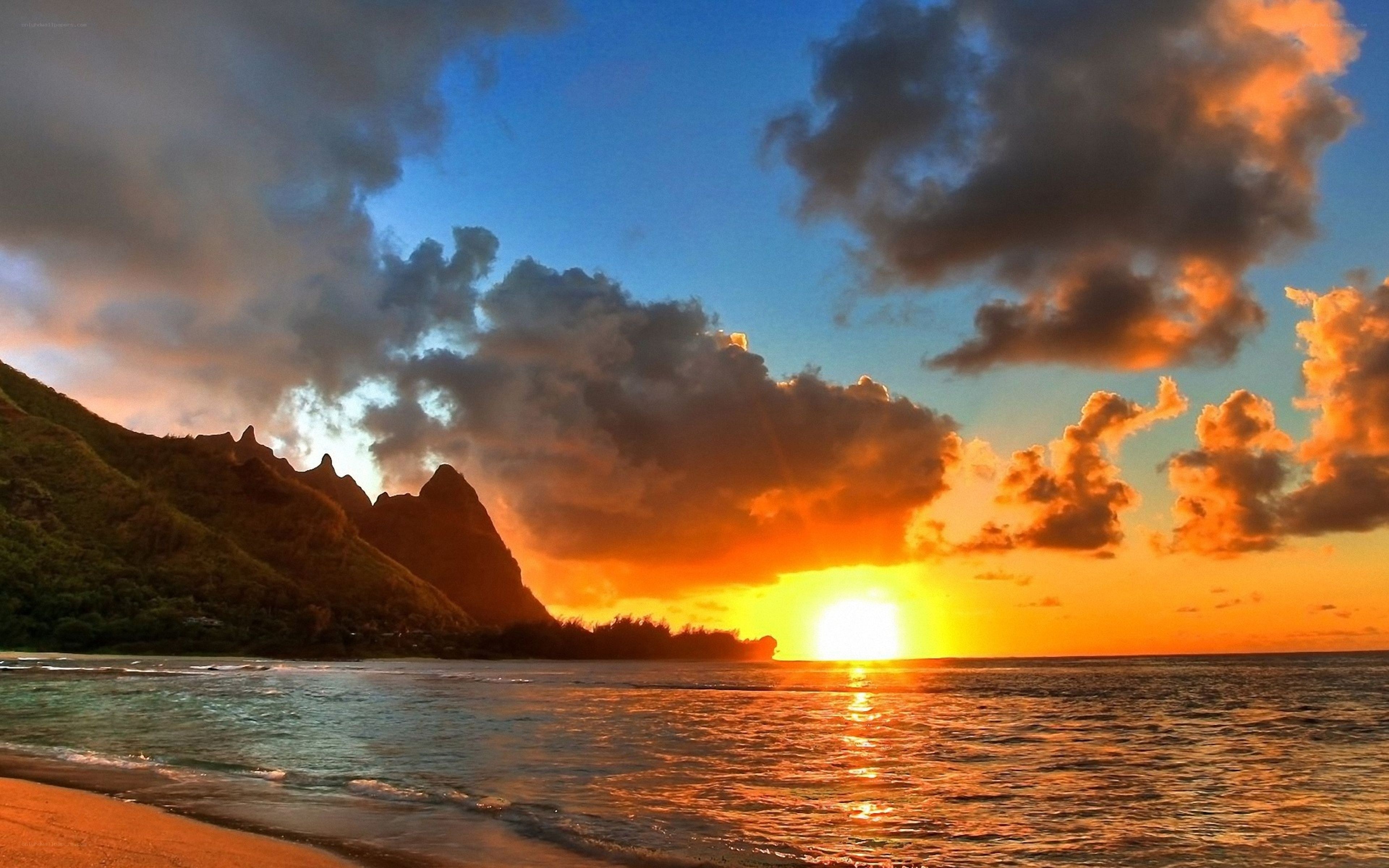 sunset over tropical island