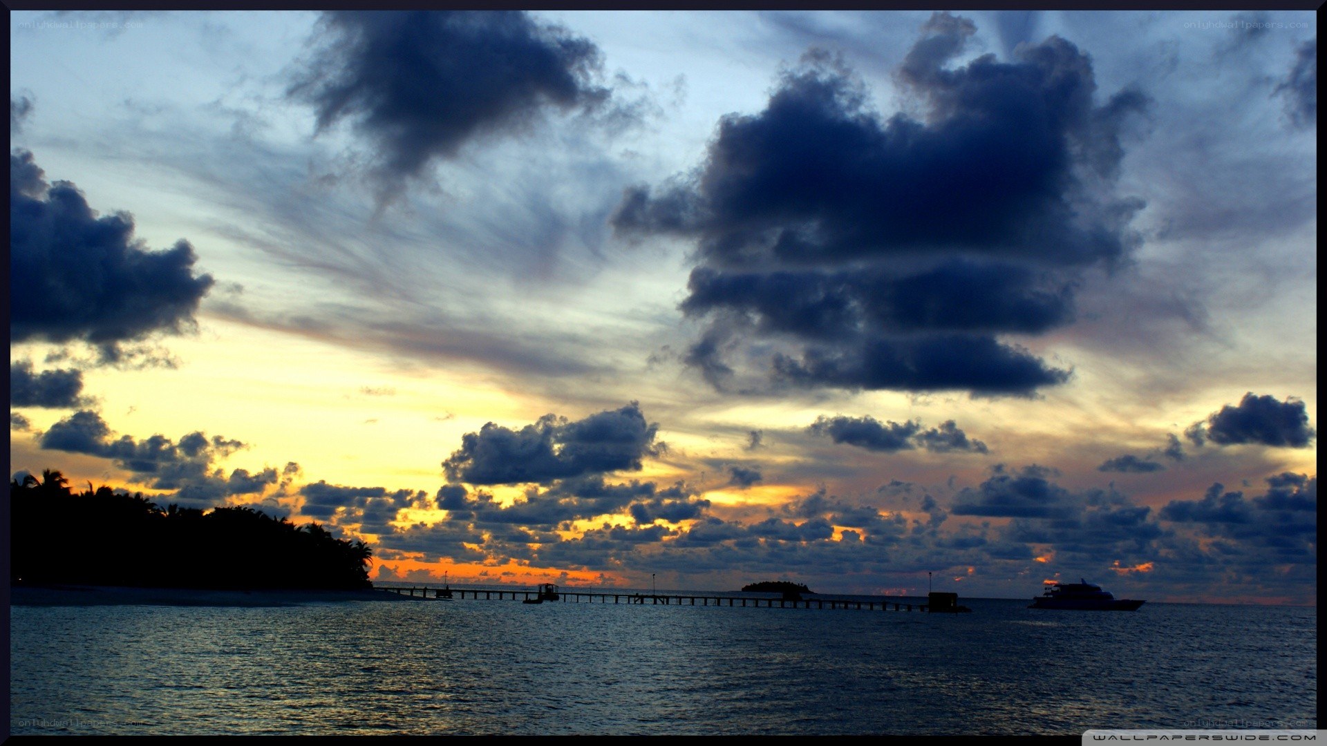 sunset over tropical island